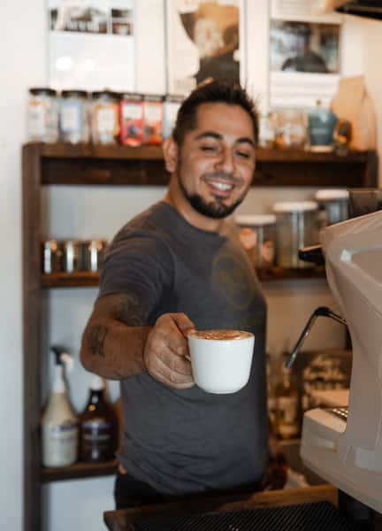 holding coffee mug