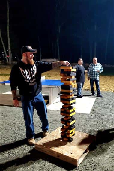 guy playing jenga