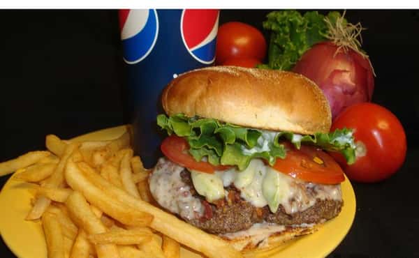 cheeseburger with lettuce, tomato and a side of french fries