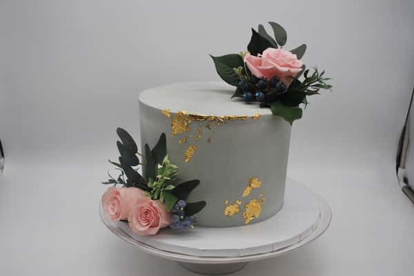 sage green with gold foil and fresh flowers