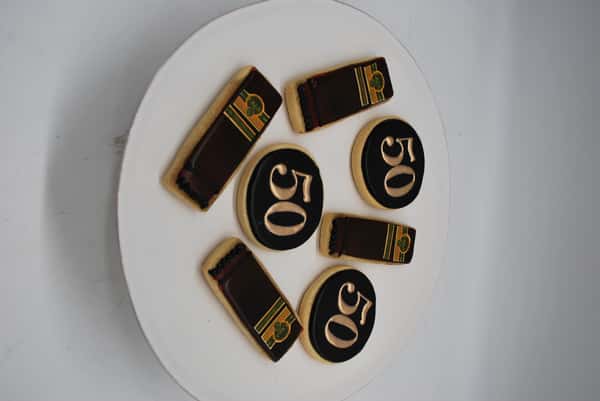 black and gold cigar and number