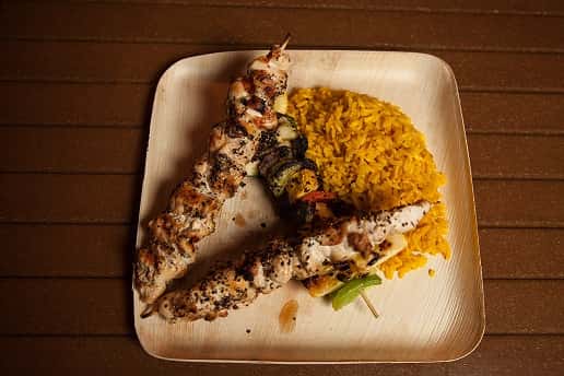chicken skewer with yellow rice