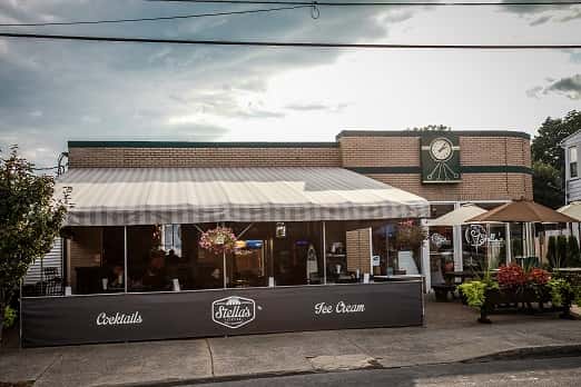 outside view of stella's with covered patio
