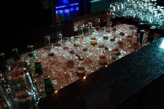 bottles of beer in ice