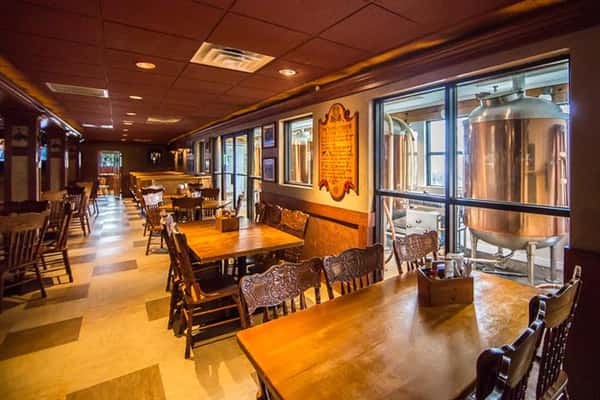 Inside the Buffalo Brew Pub with wooden tables and chairs