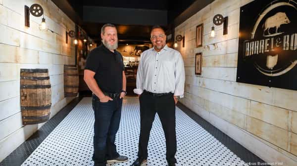 Business partners Jason Woffenden, left, and Stan Riley at the Barrel & Boar restaurant in Uptown Westerville.