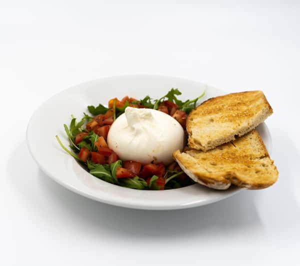 Taste the sensation that's sweeping Caffè Ethos - our Burrata! 🧀🍅 This Puglian delicacy cheese paired with fresh tomato, tangy balsamic and hearty sourdough is a delight in every bite. It's not just food, it's an experience. Join the multitude who can't get enough of its creamy goodness! #BurrataLove #CaffèEthosDelights 😋
