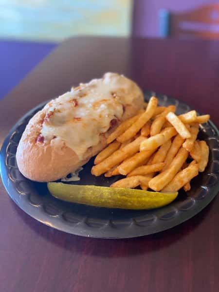chicken parmesan sandwich with french fries