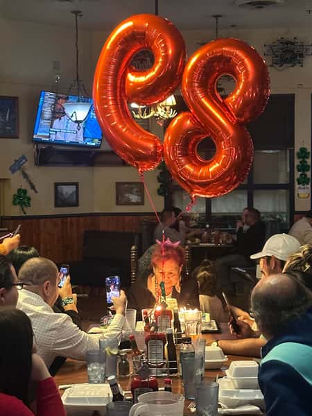 Happy 89th Birthday!  Family & friends celebrating at Cedar.  March 2023