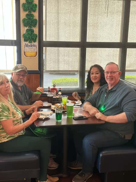 Customers dining at YFC Cedar for St. Patrick’s Day.