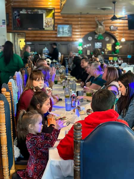 Customers enjoying St. Patrick’s Day meal at YFC Cedar.