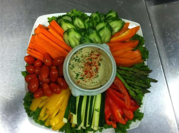 fresh veggie patter with homemade hummus in the middle