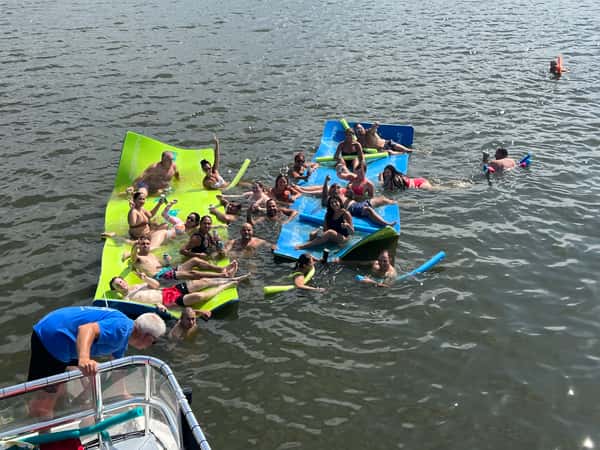 customers on swim mats