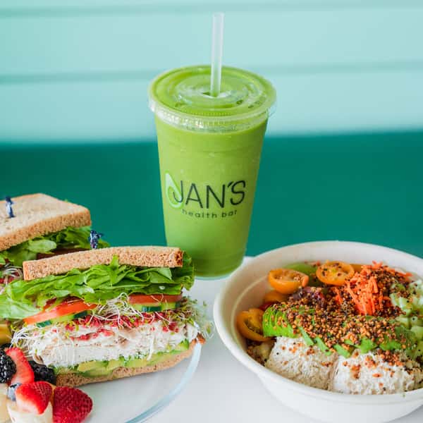 A Crunchy Kale Wrap with a side of fruit salad from Jan's Health Bar.