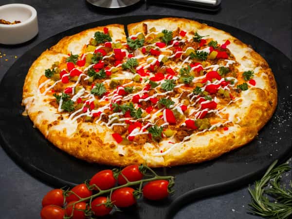 (Garlic Paste, Chicken Shawarma, Tomato, Pickles, Parsley, Mozzarella Cheese)