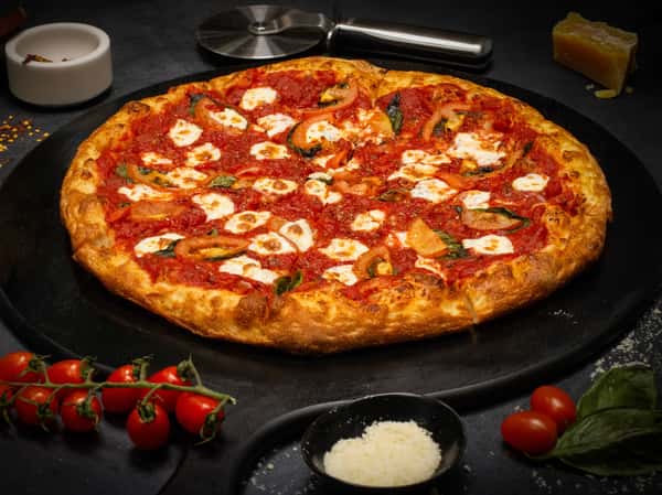 (Yaya's Tomato Sauce, Tomatoes, Fresh Mozzarella, Basil, Oregano, EVO)