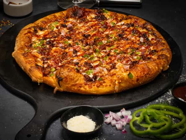 (Brisket Meat, BBQ Sauce, Green Pepper, Green Onions, Red Onion, Mozzarella Cheese)
