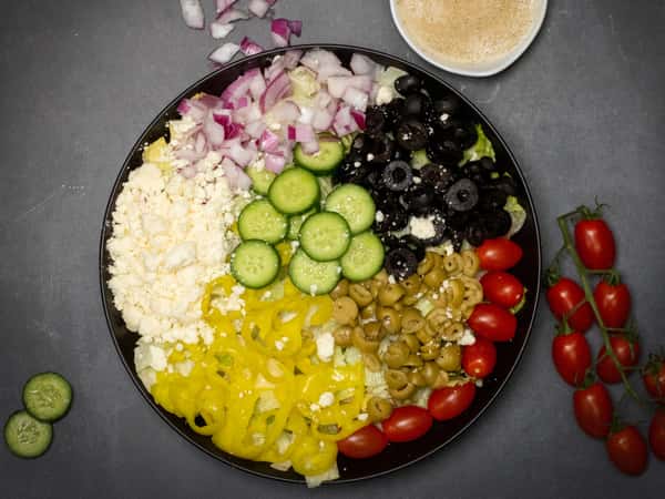 (Lettuce, Tomato, Cucumber, Olive, Red Onions, Feta Cheese, Banana Peppers)