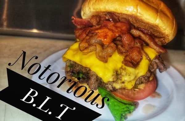 Burger called the Notorious B.L.T. topped with bacon, lettuce, and tomato