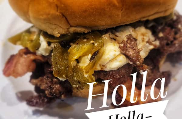 Burger called Holla topped with melted cheese and green chile