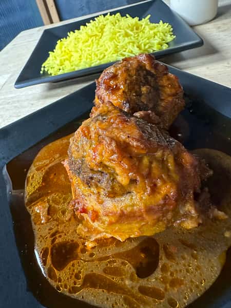 Giant meat balls in a broth