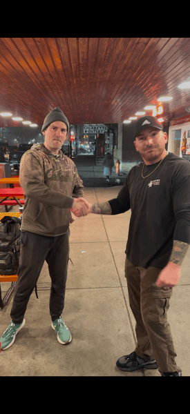 two participants shaking their hands