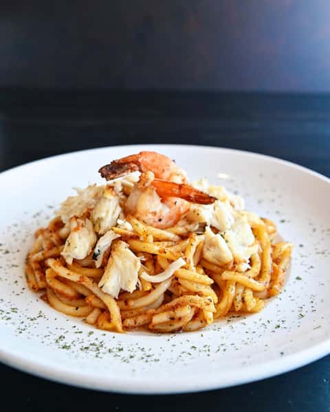 Our Newest Garlic Noodles wokked with Jumbo Crab Lumps & shrimps