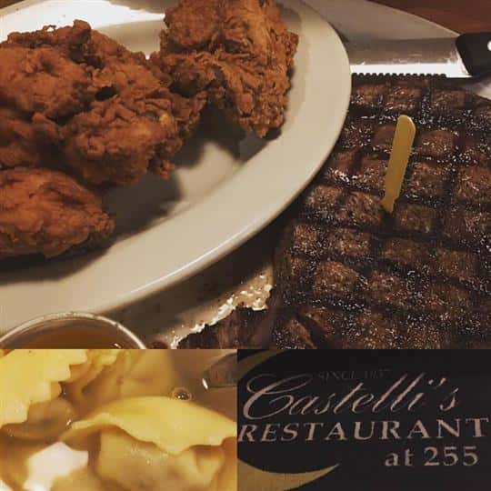 A plate of fried chicken and a large piece of grilled steak.
