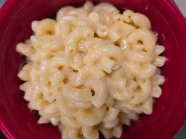 Close-up of creamy yellow elbow macaroni and cheese