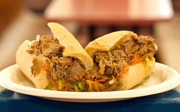 Pulled chicken poboy with lettuce and tomato