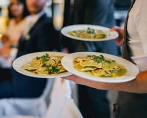server on even bring 3 plates of pasta