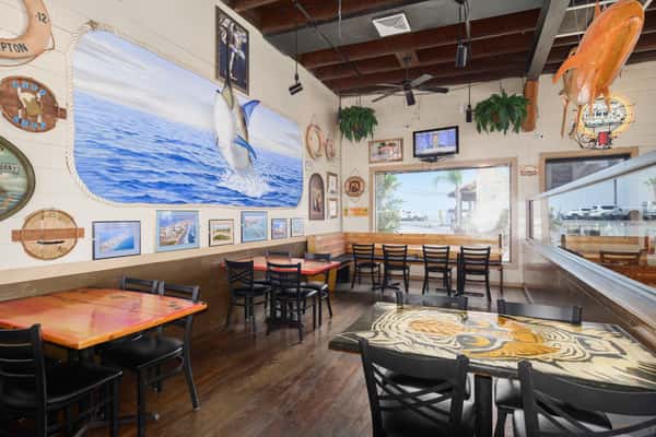 interior seating at restaurant with nautical decor