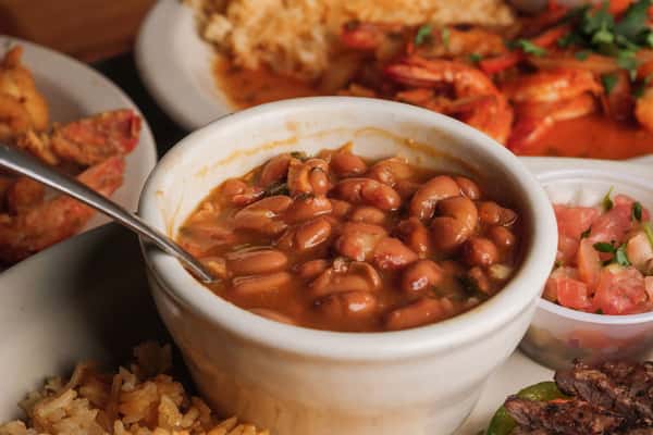 cup of baked beans with other entrees