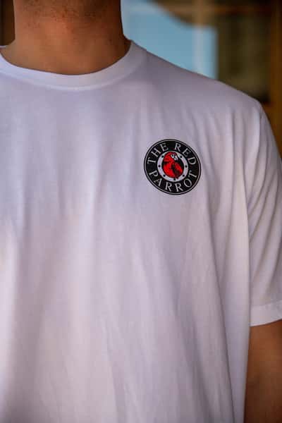 red parrot logo front of shirt