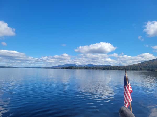 Waterfront view with American flag