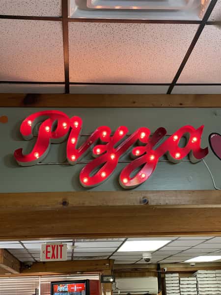 pizza sign inside the restaurant