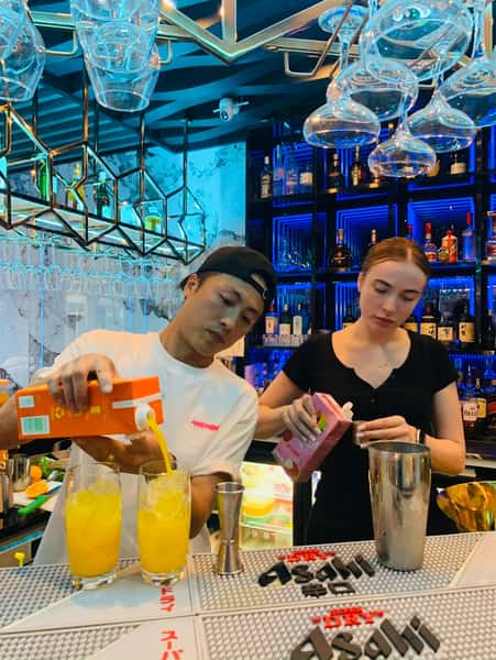 People enjoying drinks at Sumiya restaurant bar