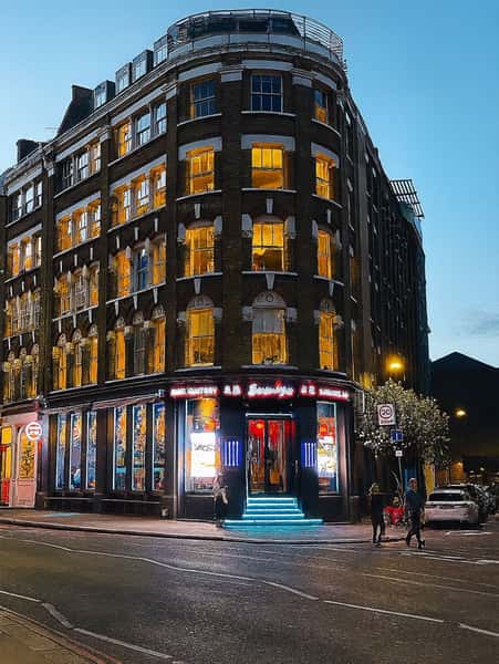 Exterior of Sumiya restaurant building illuminated at night