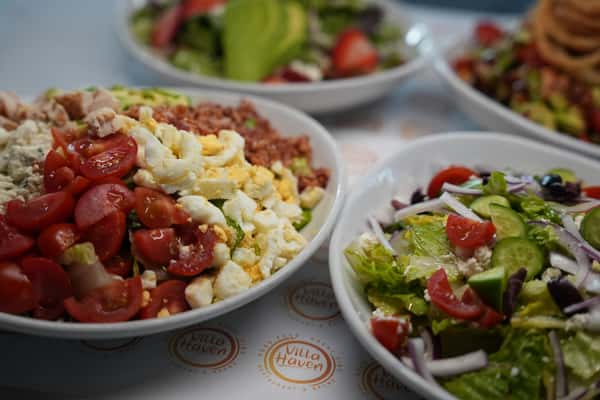 A variety of plated meals catered for many people