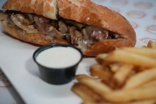 Meaty roll with sauce and fries