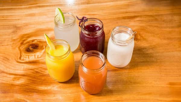 Fresh fruit juices and creamy beverages served over ice.