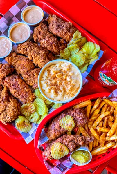 chicken strips, fries, mac and cheese 