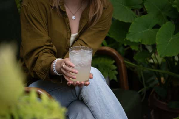 model holding drink