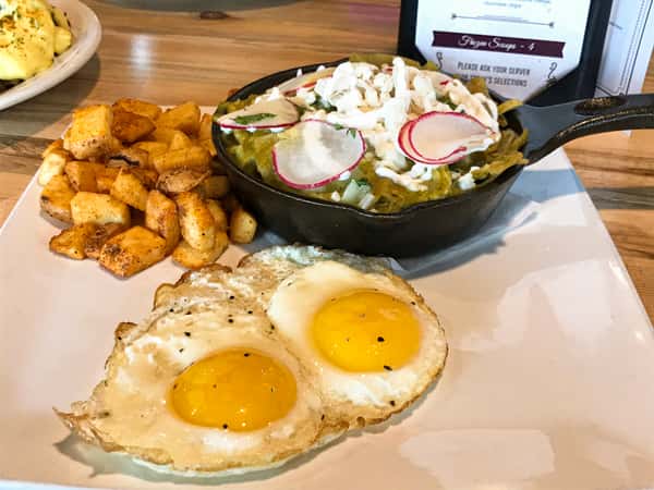Wake the Dead Chilaquiles with green chili sauce