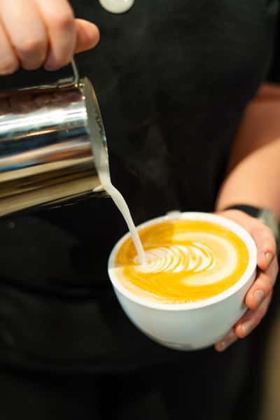 Bartender serving coffee