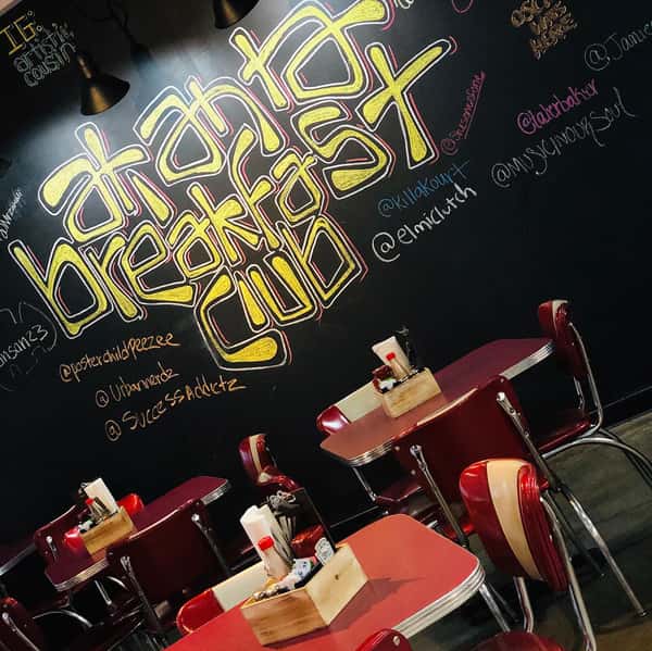 interior of restaurant with graffiti style wall art