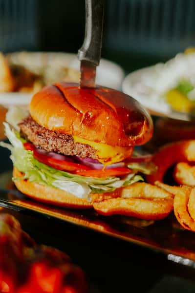 Mammoth Burger with American Cheese & Onion Rings