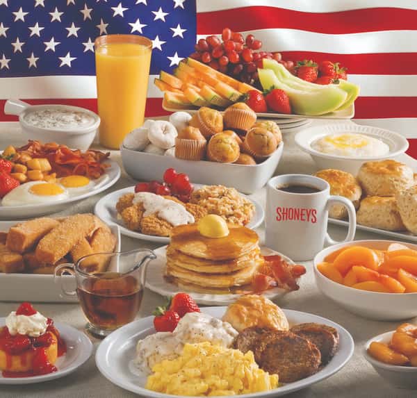 large spread of menu items with American flag backdrop
