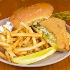A huge piece of North Atlantic Haddock nestled on a Costanzo Hard Roll w/ fries