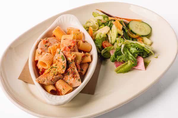 SPICY RIGATONI VODKA + HALF SALAD